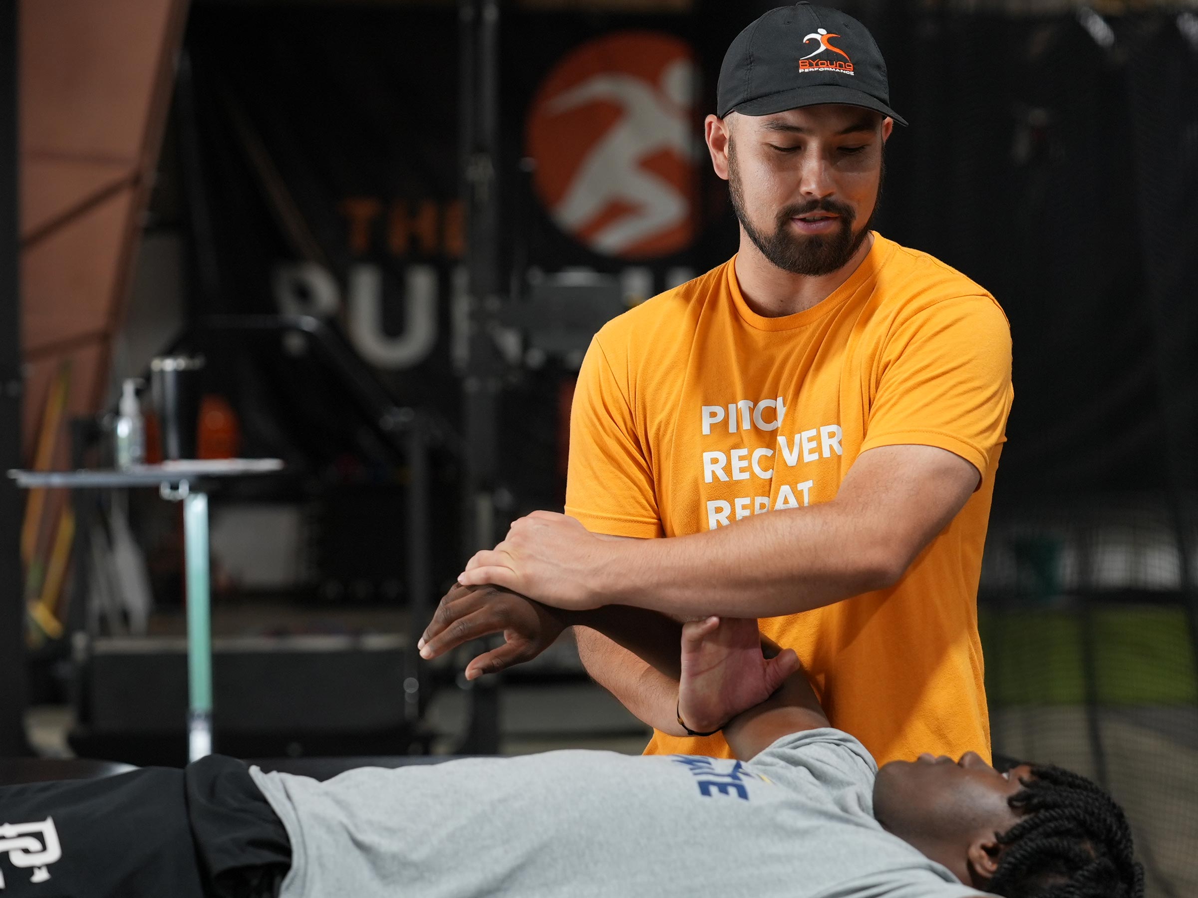 physical therapy on a patient's arm